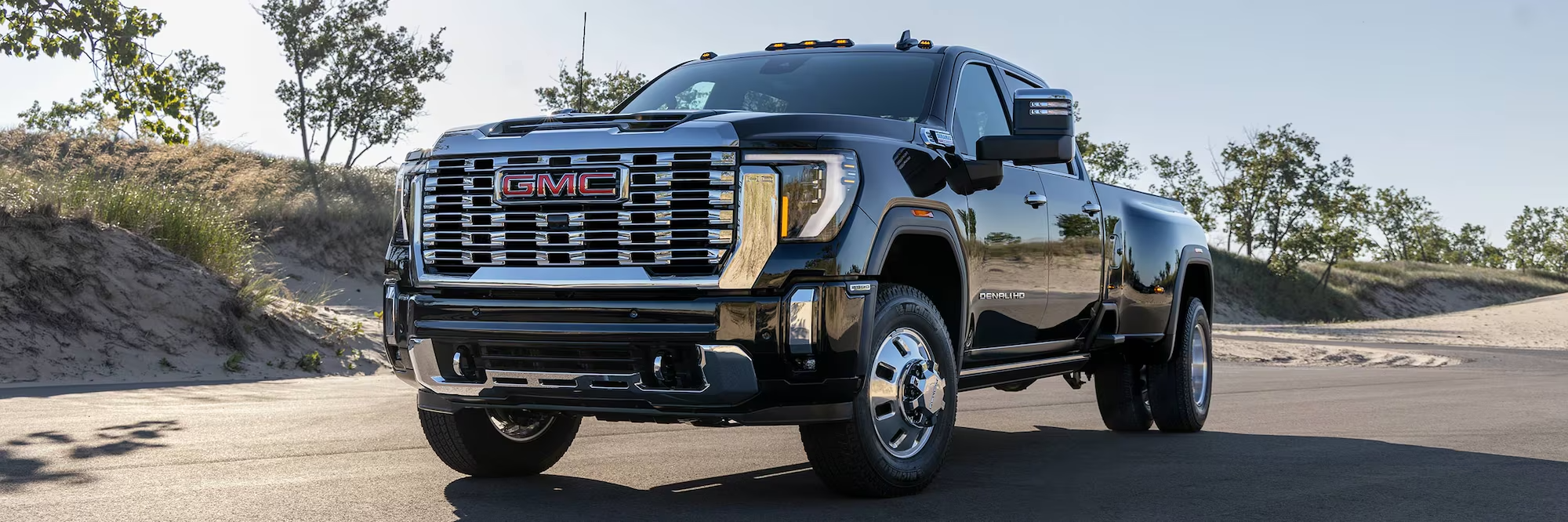 2025 GMC Sierra 3500 HD driving in Dover, OH