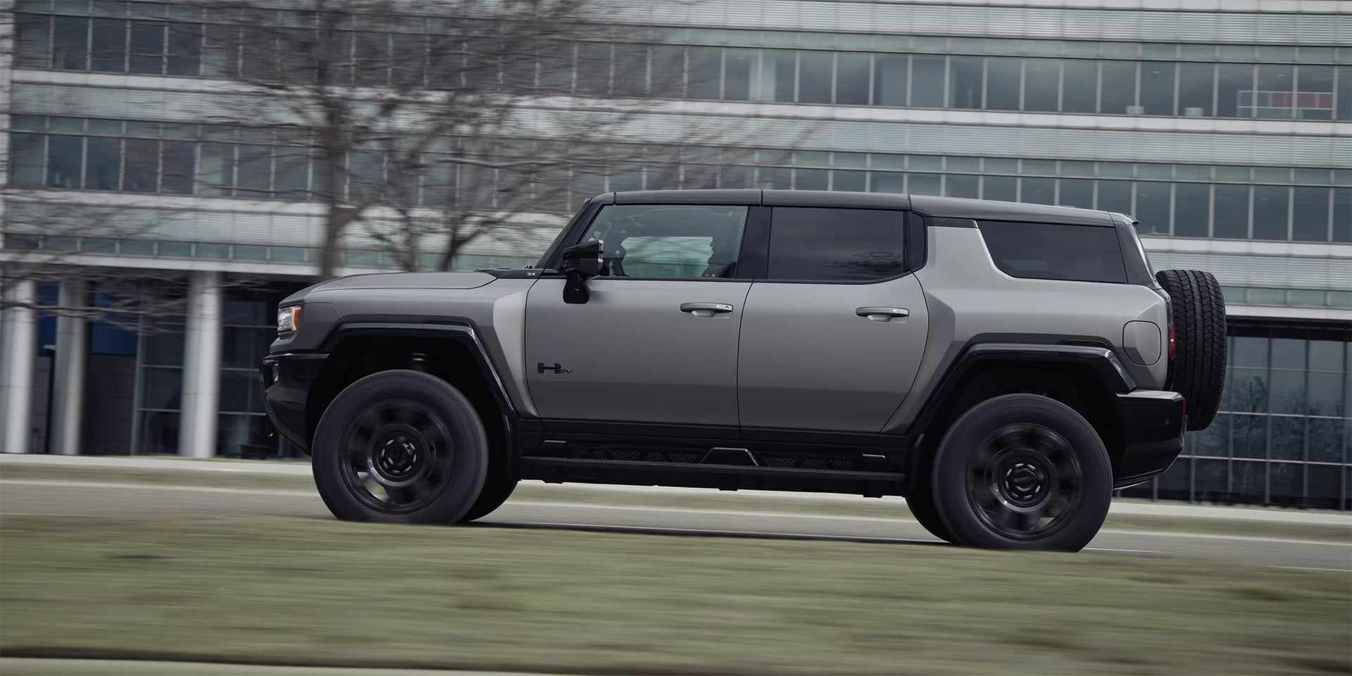 2026 GMC Hummer EV SUV driving near Canton