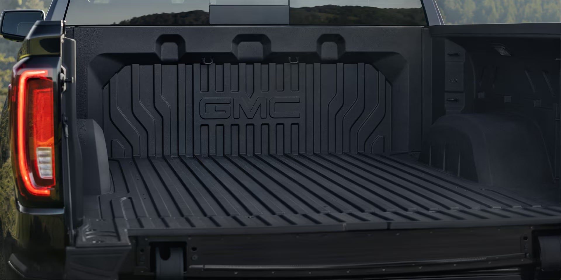 Open tailgate of the 2026 GMC Sierra 1500 in Dover