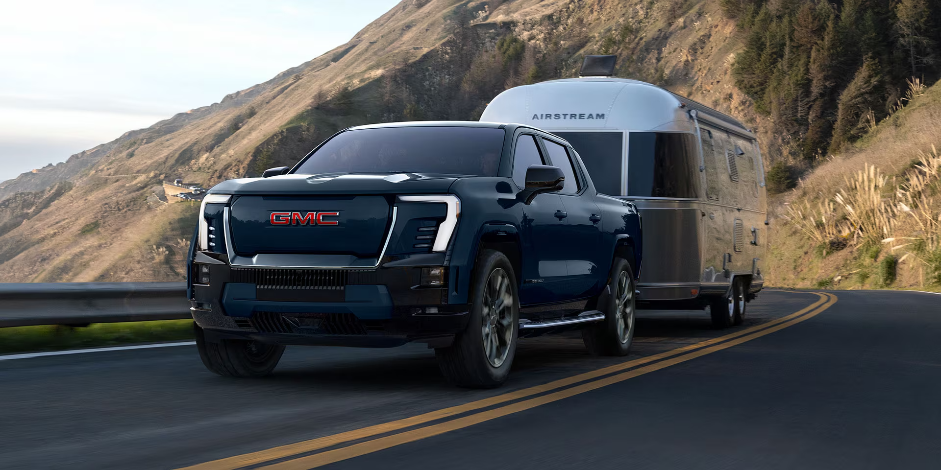 2026 GMC Sierra EV driving in Dover